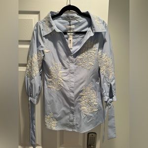 Alice and Olivia Blue button down with white embroidery and tie sleeves